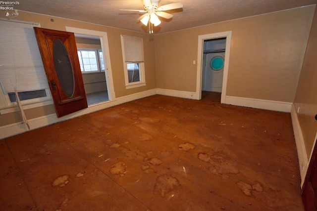 unfurnished bedroom with ceiling fan