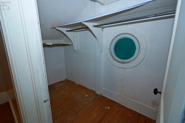 washroom with wood-type flooring