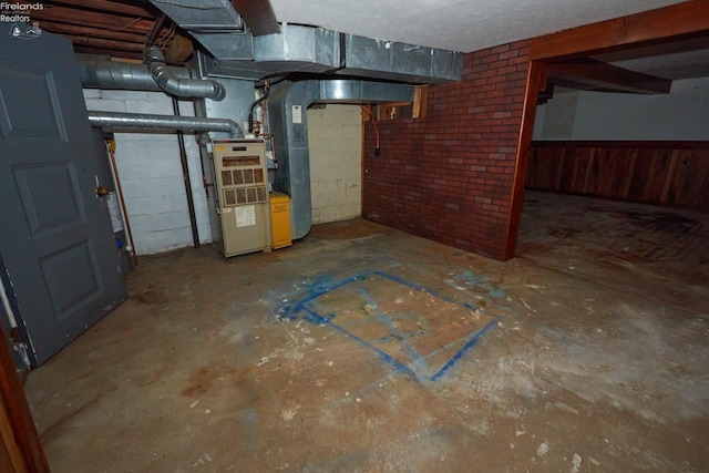 basement featuring heating unit