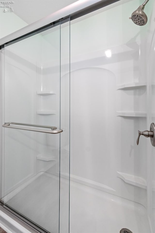 bathroom with an enclosed shower