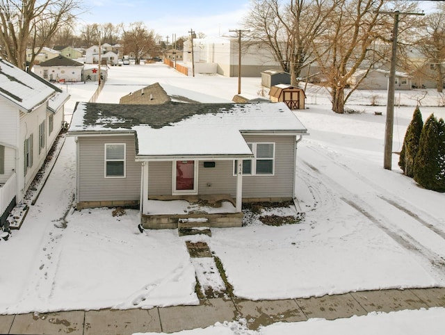 exterior space with a shed