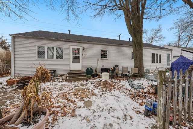 view of snow covered property