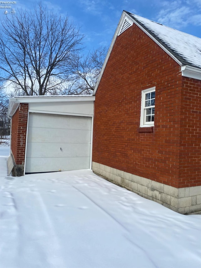 view of snow covered property