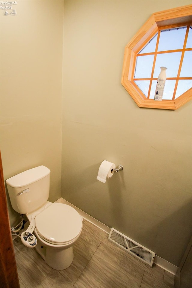 bathroom featuring toilet