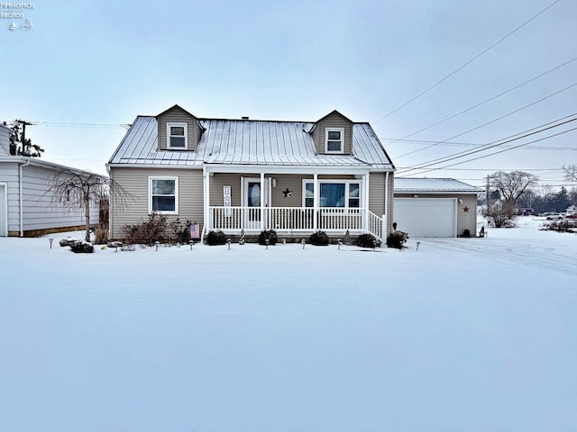 view of front of home with covered porch and a garage