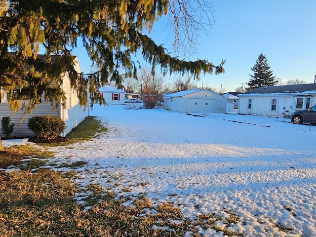 view of yard covered in snow