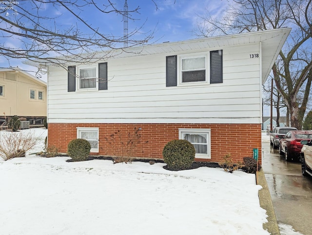 view of snow covered property