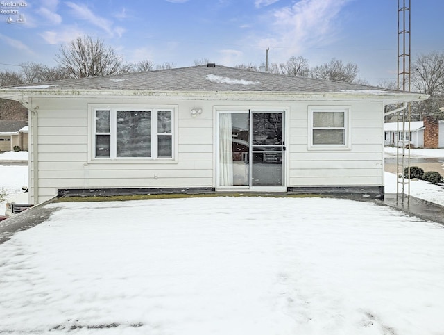 view of snow covered property