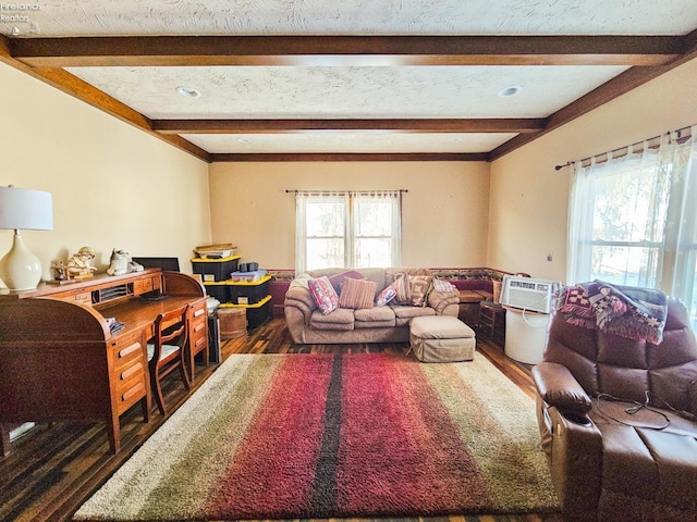 living room with beam ceiling and dark hardwood / wood-style flooring