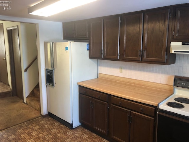 kitchen featuring range with electric stovetop, backsplash, dark brown cabinets, and white fridge with ice dispenser