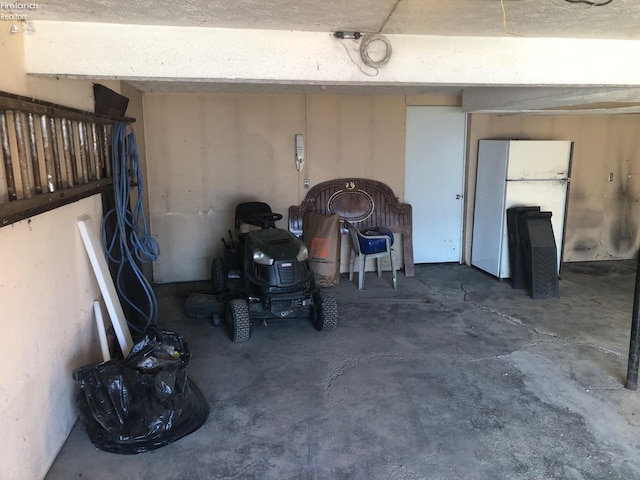 garage featuring white refrigerator