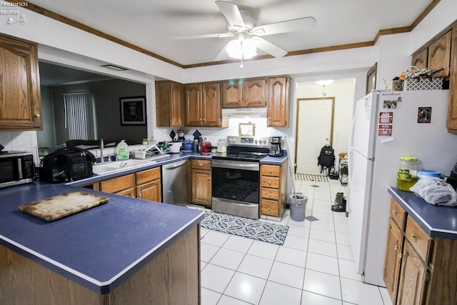 kitchen featuring stainless steel appliances, sink, kitchen peninsula, ceiling fan, and light tile patterned floors