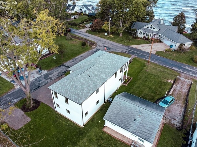 bird's eye view with a water view