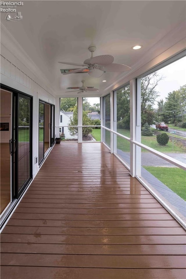 unfurnished sunroom featuring plenty of natural light