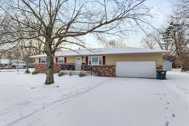 single story home featuring a garage