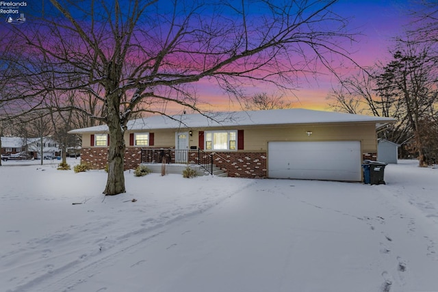 single story home with a garage