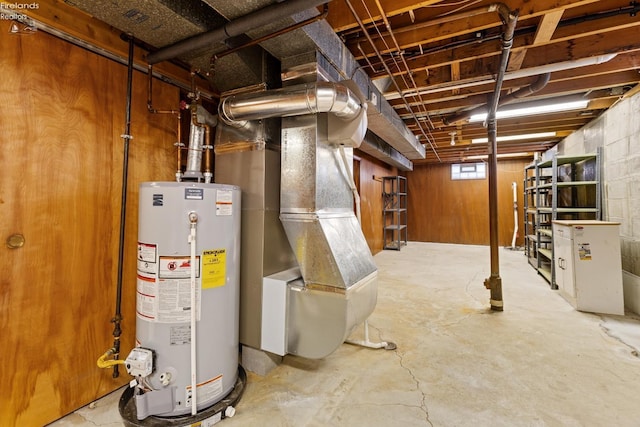 basement with heating unit and gas water heater