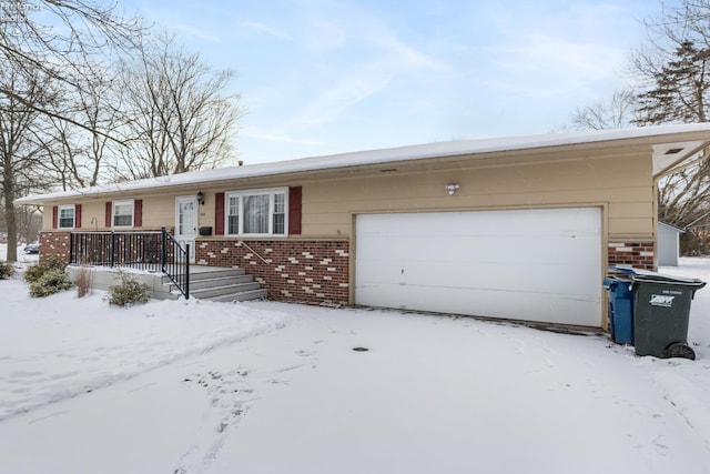 single story home featuring a garage