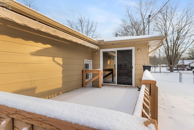 view of snow covered deck