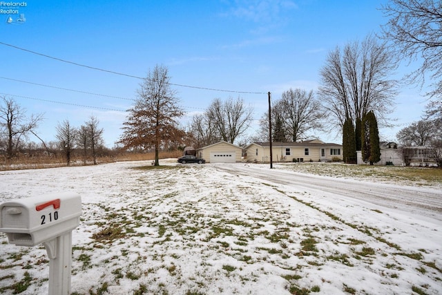 view of yard layered in snow