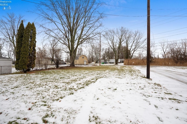 view of yard covered in snow