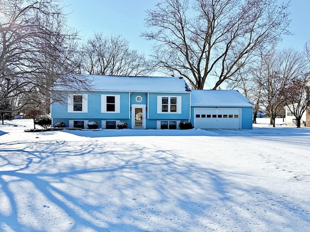 raised ranch featuring a garage