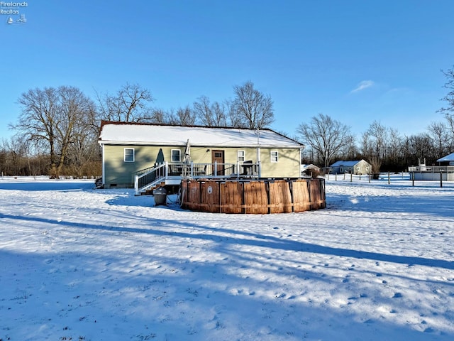 view of snow covered property