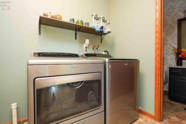 washroom featuring washer and dryer