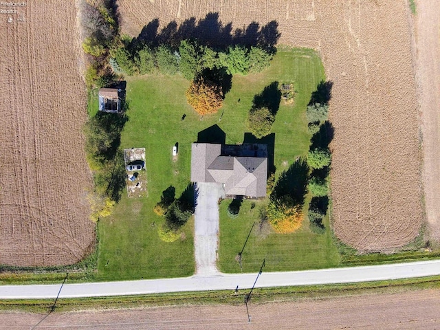 birds eye view of property featuring a rural view