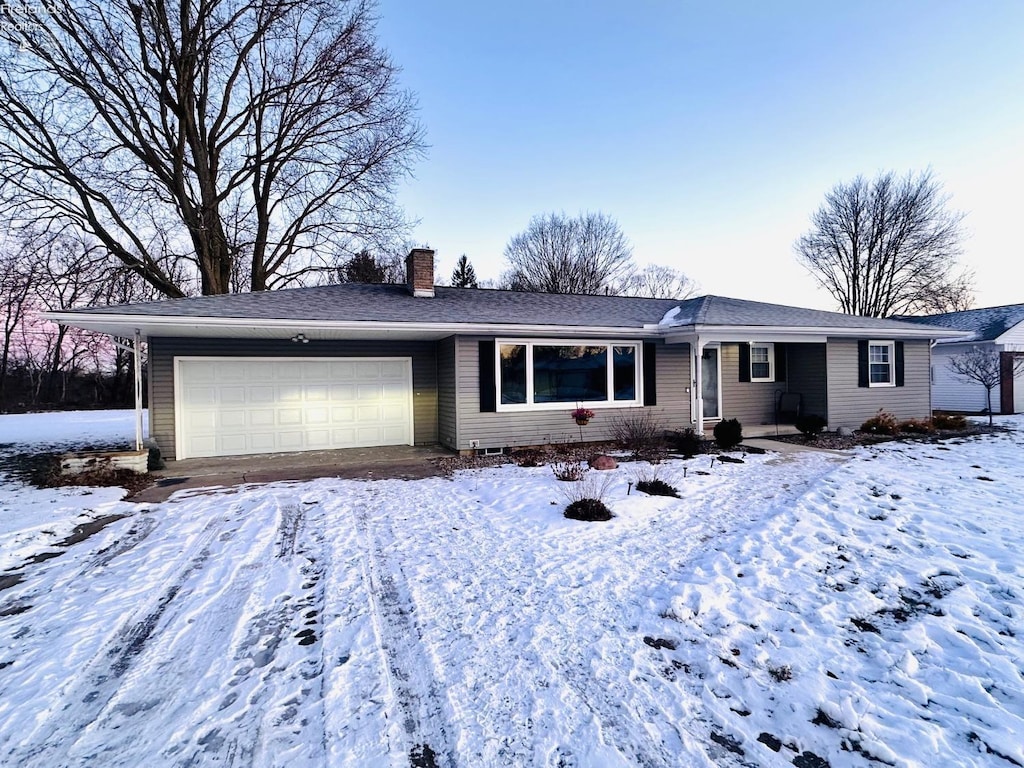 single story home with a garage