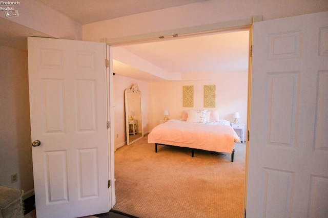 bedroom featuring carpet flooring