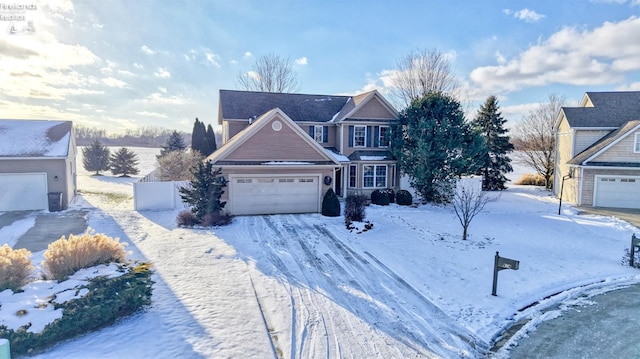 view of front of property featuring a garage