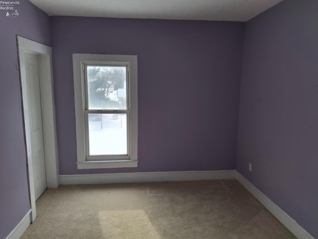 view of carpeted spare room