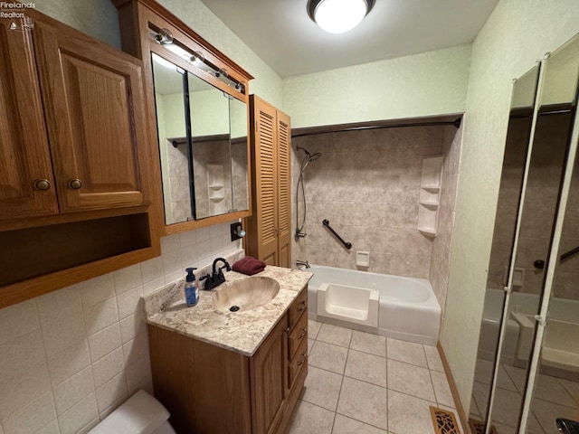 bathroom featuring vanity, shower with separate bathtub, decorative backsplash, and tile patterned flooring