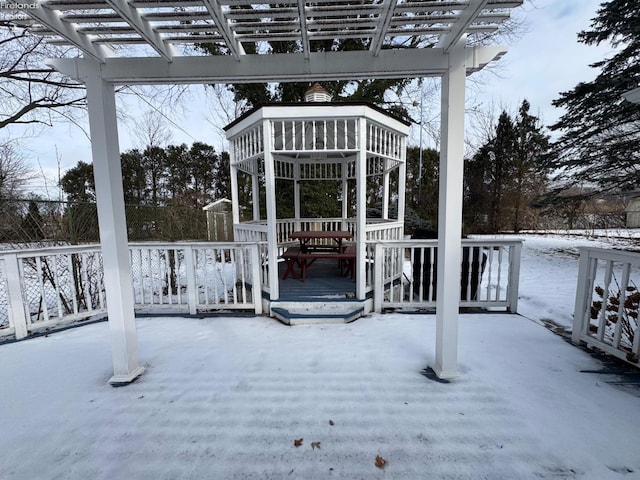 view of snow covered deck