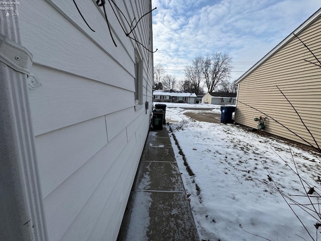 view of snow covered property