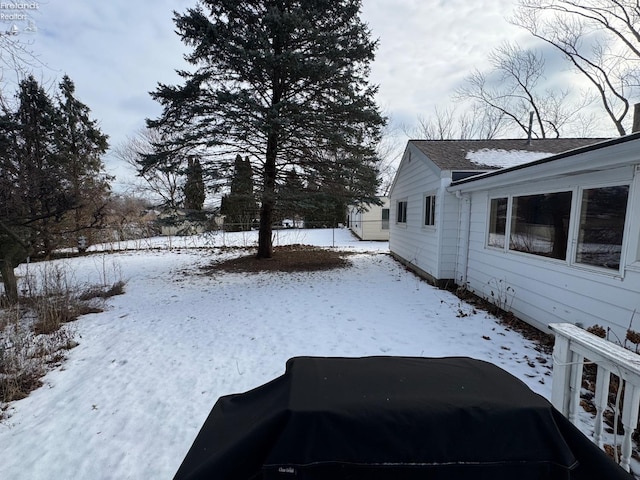 view of snowy yard