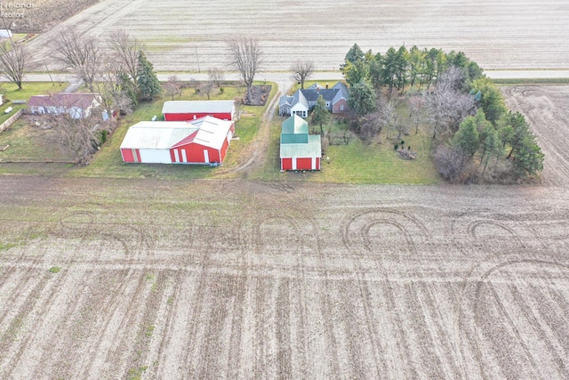 birds eye view of property featuring a rural view