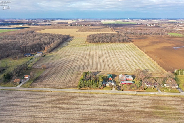 birds eye view of property featuring a rural view