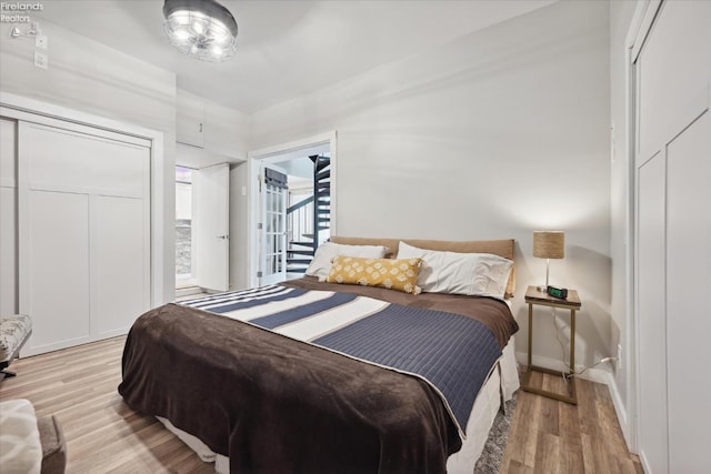 bedroom featuring light wood-type flooring