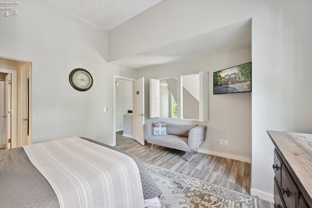 bedroom featuring light wood-type flooring