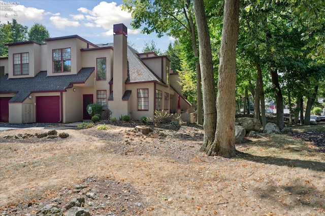 view of front of property with a garage