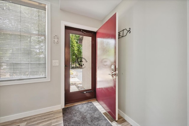 doorway featuring light hardwood / wood-style floors