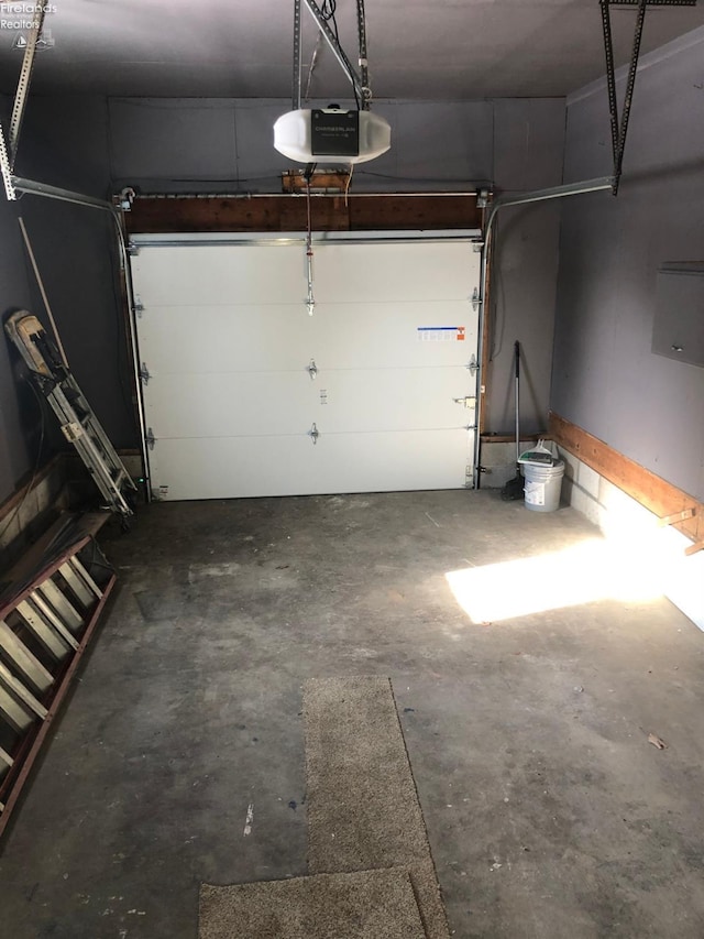 garage featuring a garage door opener