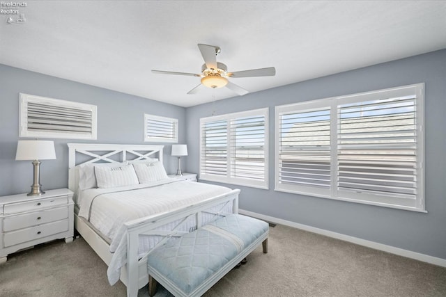 bedroom featuring light carpet and ceiling fan