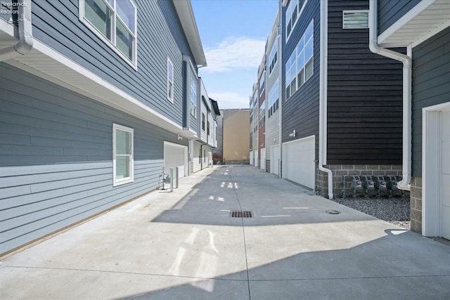 view of patio / terrace featuring a garage