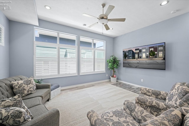 living room featuring ceiling fan