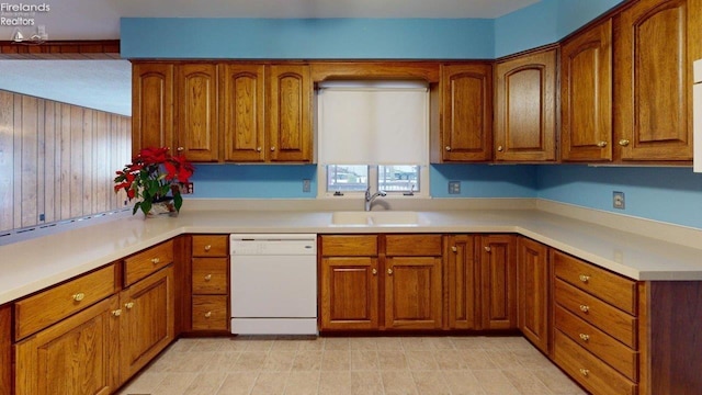 kitchen with sink and white dishwasher