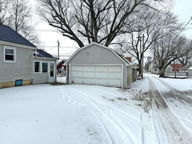 view of snow covered garage