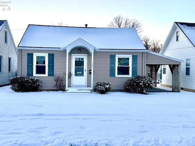 view of front of house with a carport